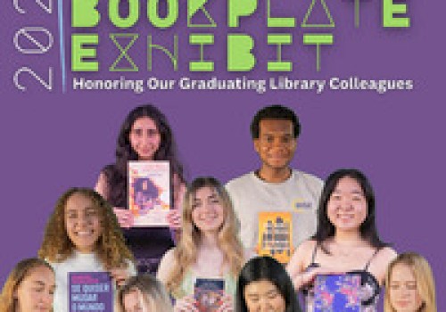 A group of people holding books, with 